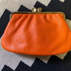 Vintage orange colored faux leather wallet